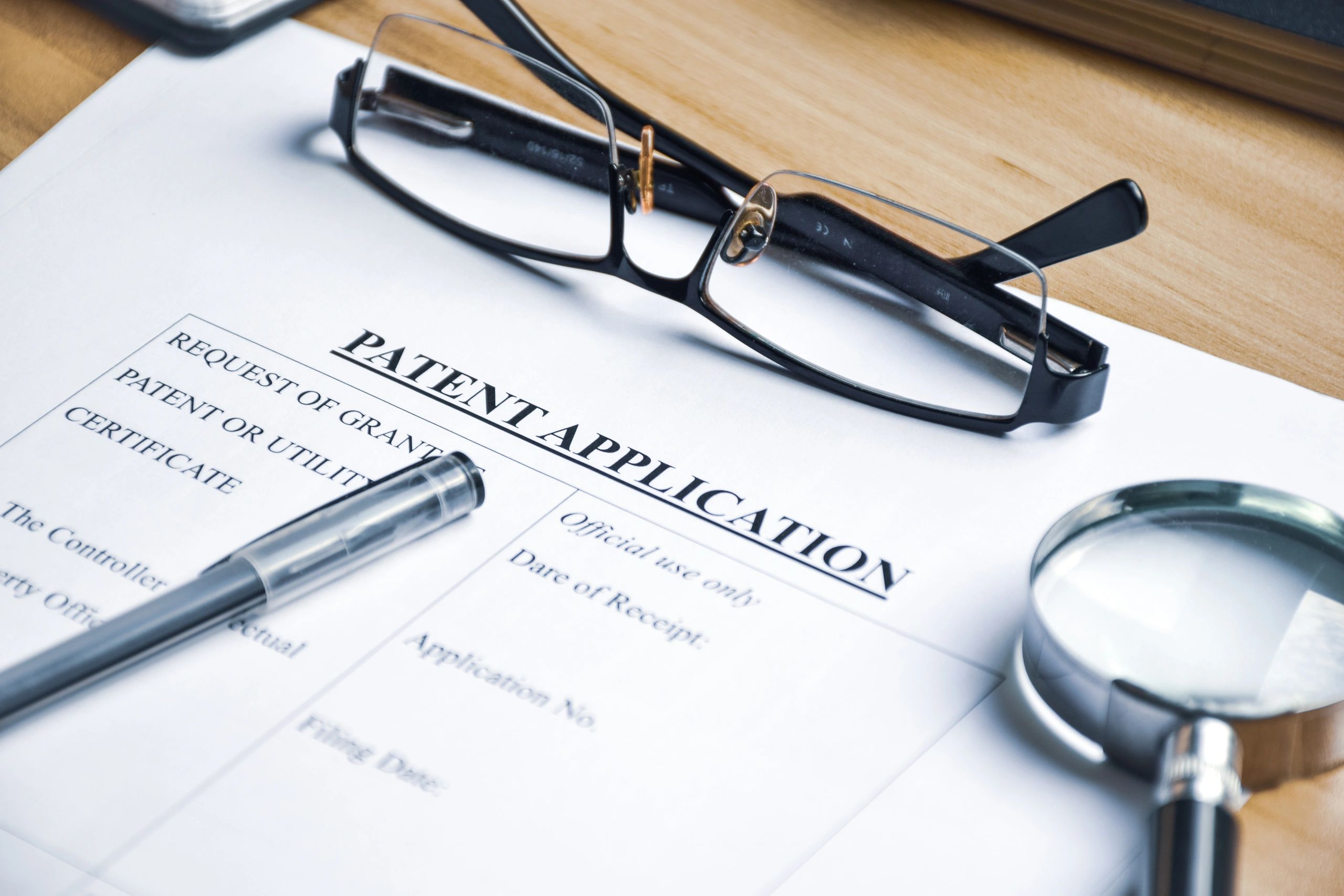 Permit application paperwork on an office desk