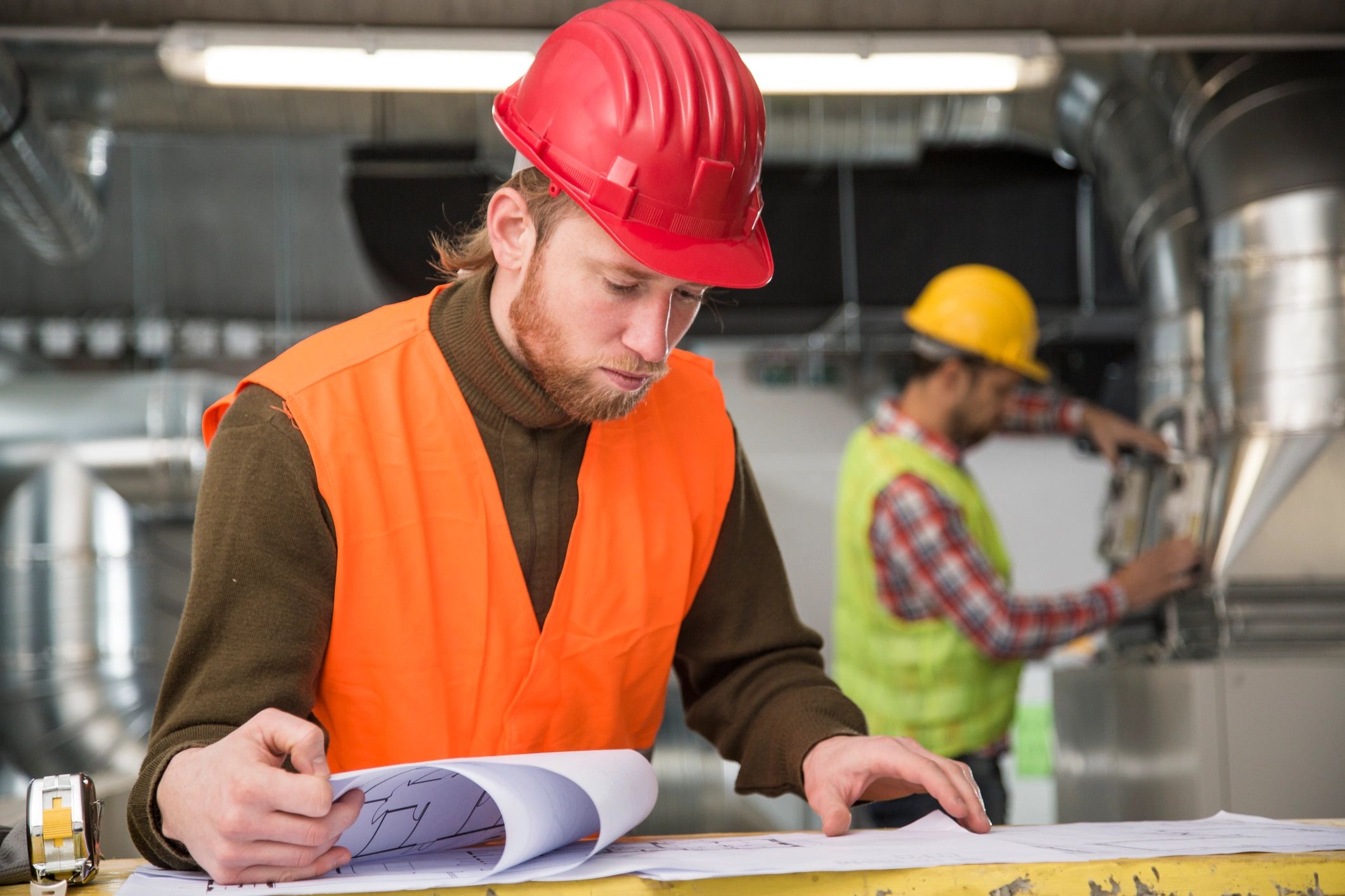HVAC workers on a construction site